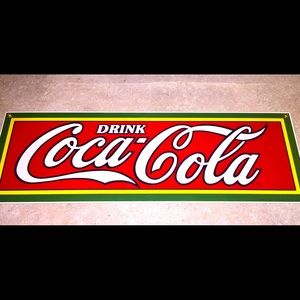 Vintage tin Coca Cola sign